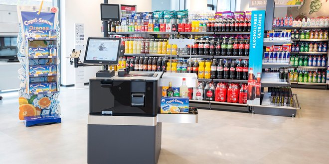 Fotografie Shopper Experience - Selbstzahlerkassen für den Checkout im Supermarkt