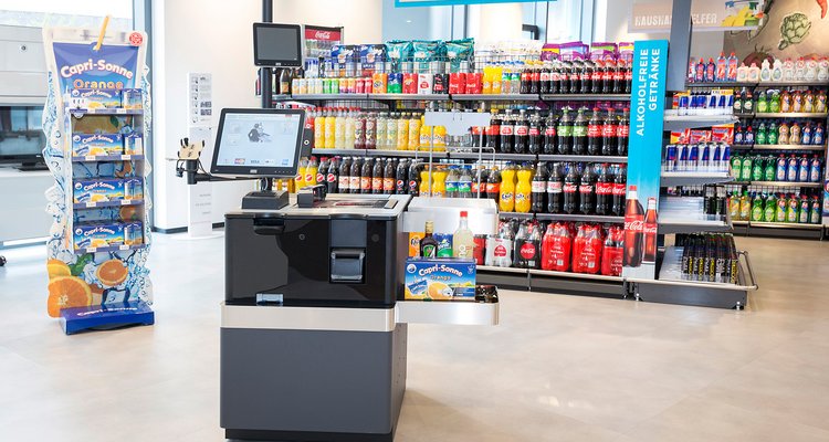 Fotografie Shopper Experience - Selbstzahlerkassen für den Checkout im Supermarkt