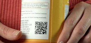 Bild zeigt eine Dose mit einem QR-Code anstatt Barcode
