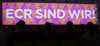 Intro Screen auf dem ECR Tag 2023 mir den Worten ECR sind wir!