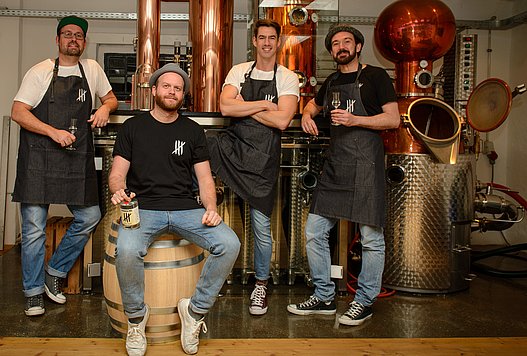 Foto der vier Teammitglieder der Veedel Distillers